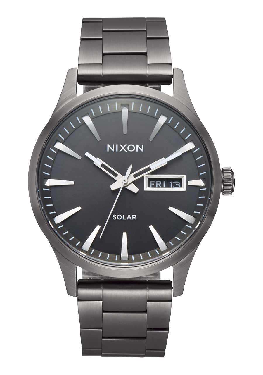 Sleek stainless steel wristwatch with a dark gray face and solar-powered functionality.