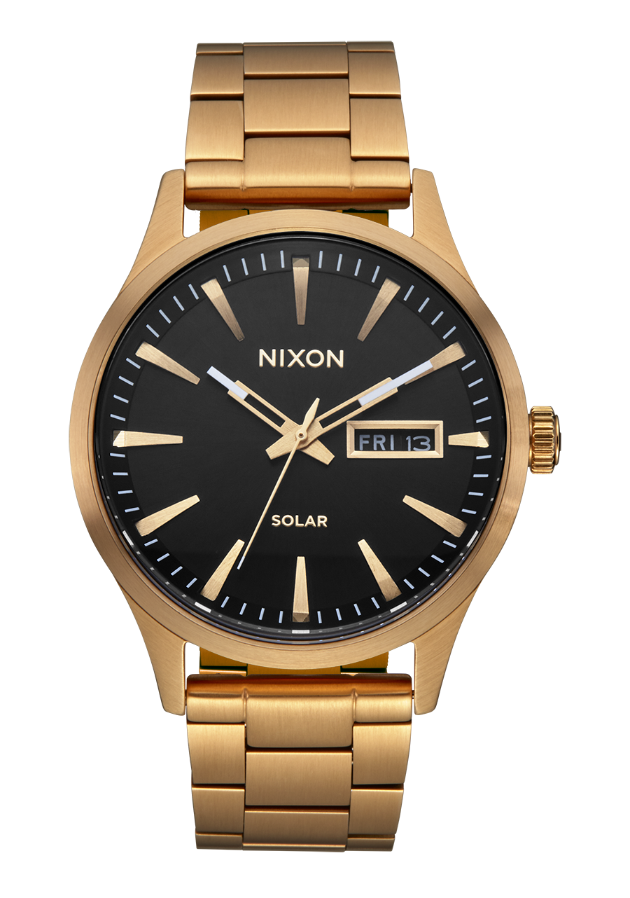 Gold-toned wristwatch with a black dial face and day-date display.