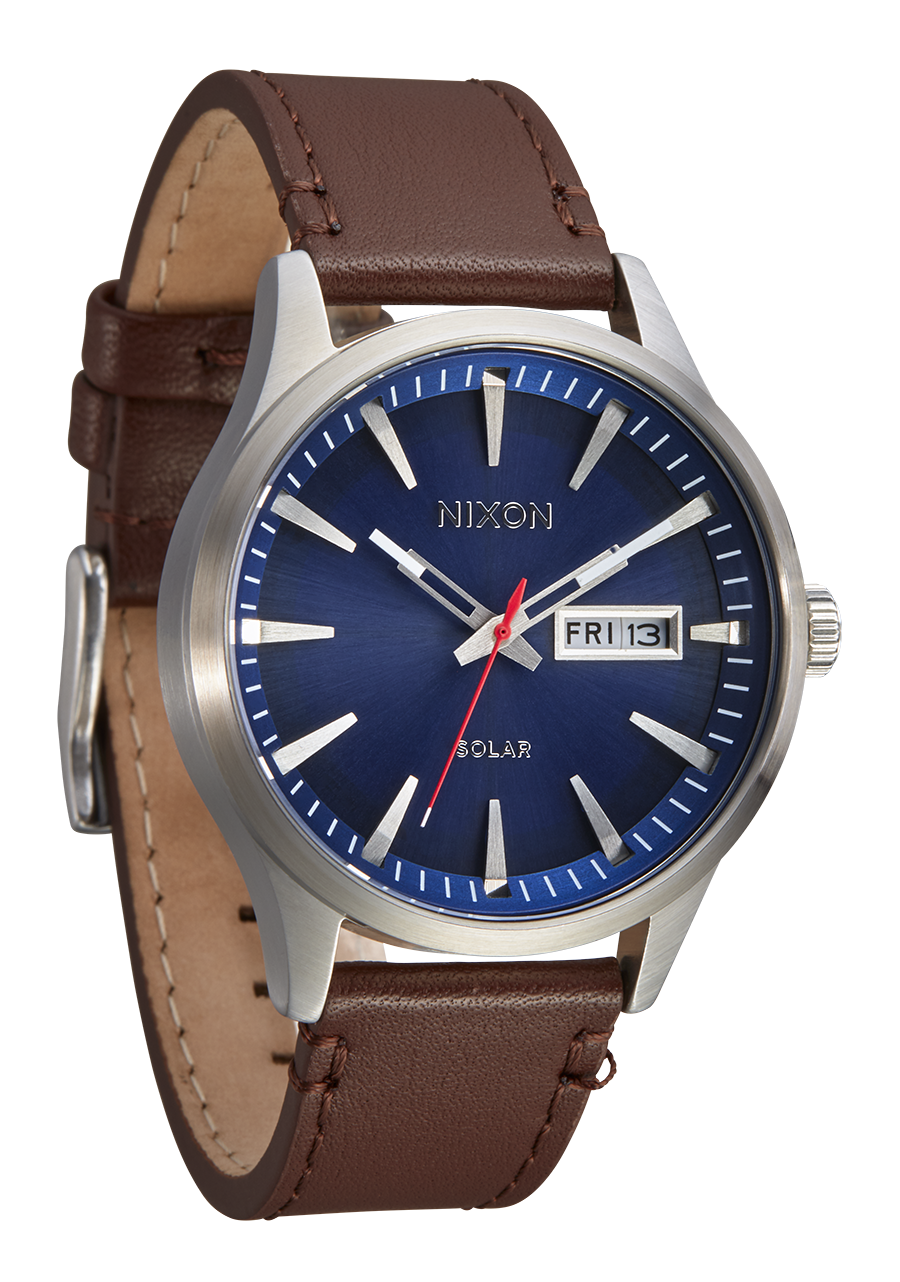 Wristwatch with a blue dial face and brown leather strap.