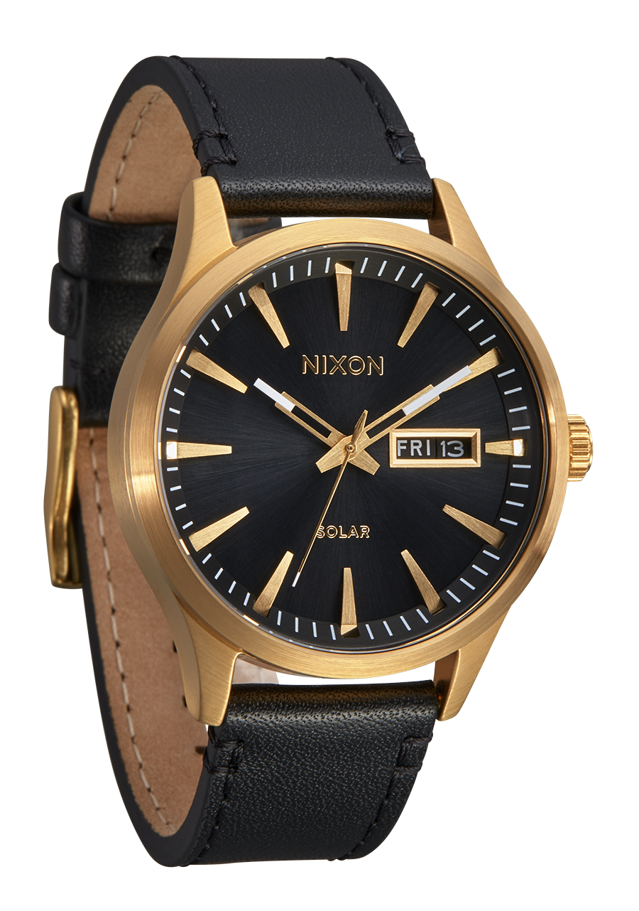 Gold-toned wristwatch with a black face and leather strap.