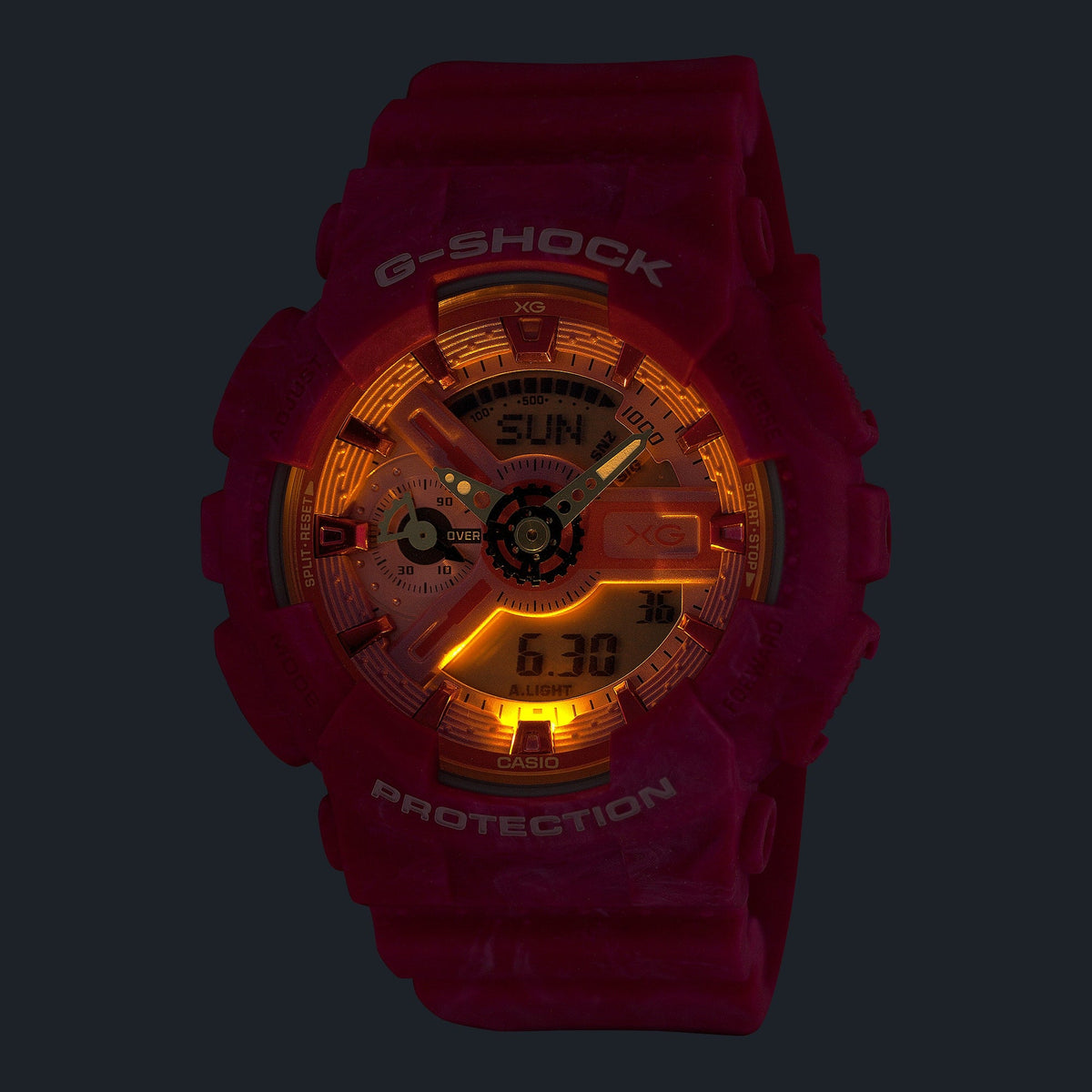 G-Shock GMAS110XG-4A with the LED light illuminating the digital display