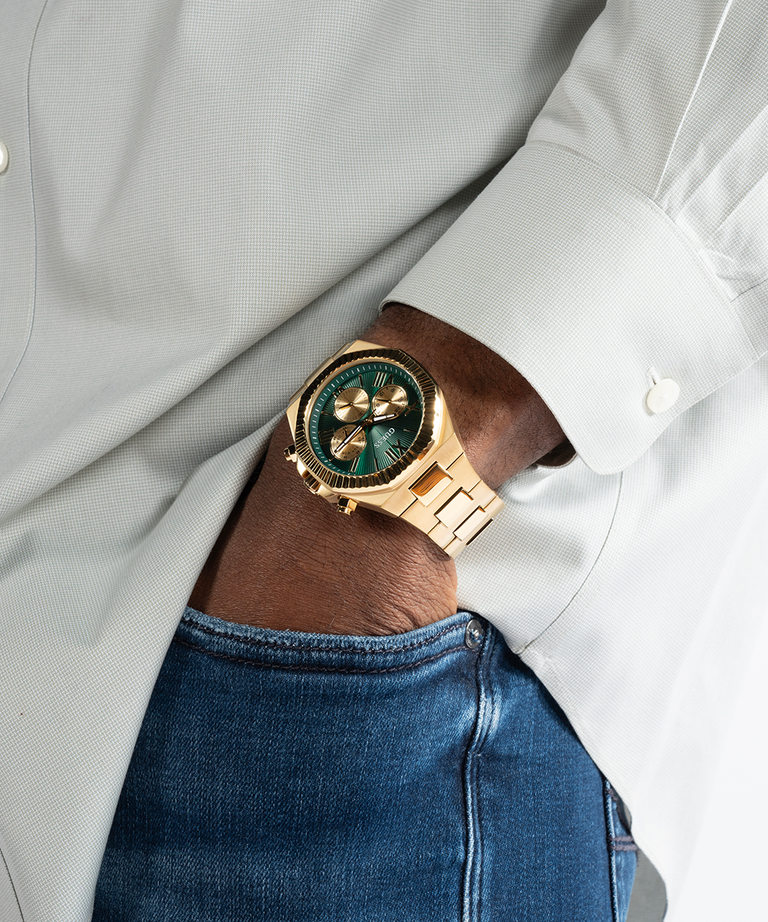Guess Gold Green Dial Gold Bracelet Watch GW0703G2 with a gold-tone stainless steel bracelet and green sunray multifunctional dial.
