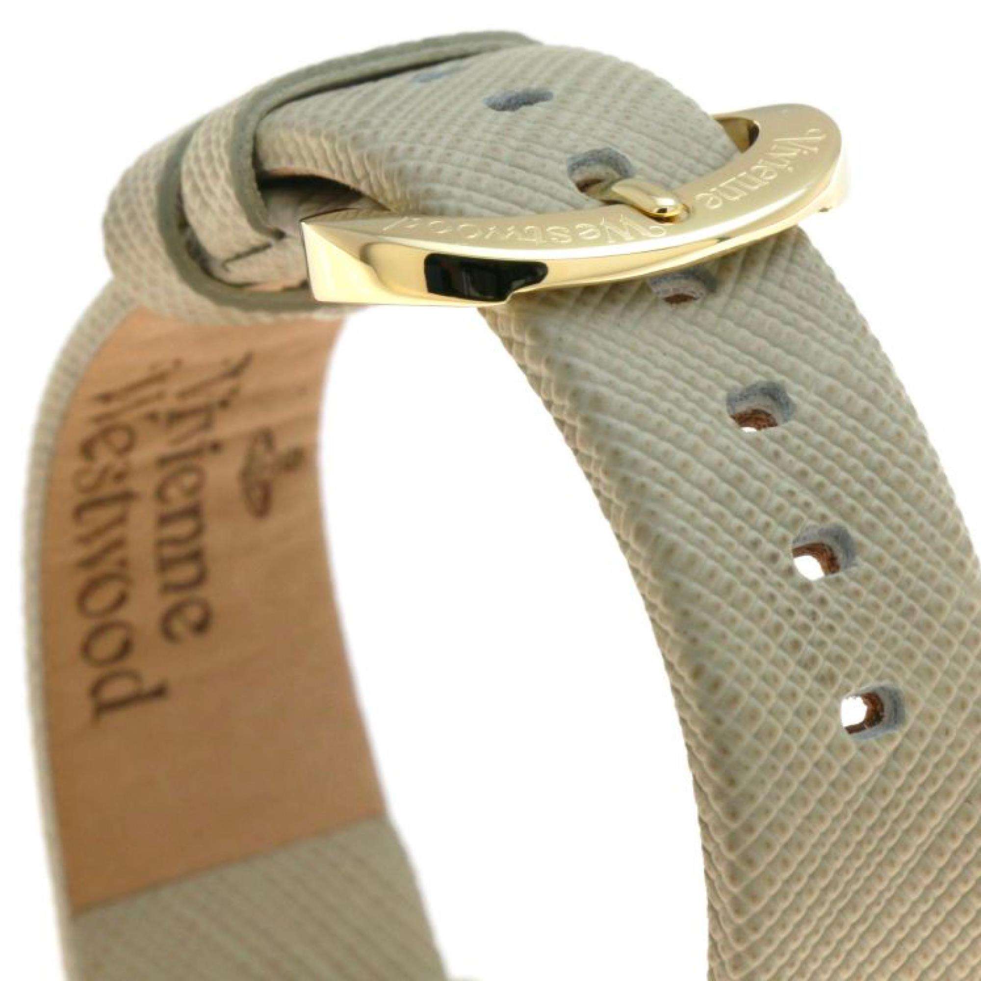 Vivienne Westwood Orb Pop women's watch with a silver dial and cream leather strap. Side profile view.
