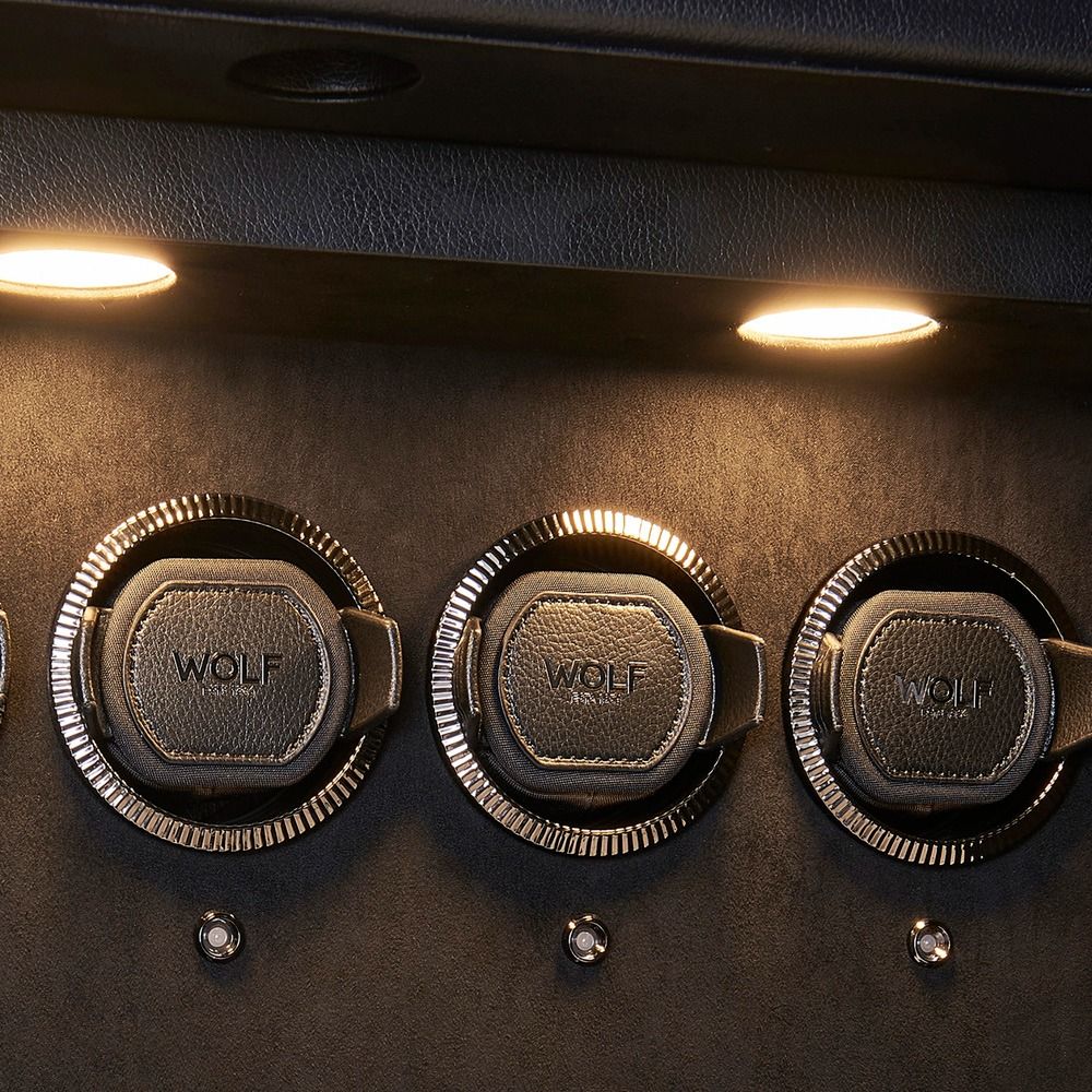 WOLF Athos 4 Piece Watch Winder Safe in Black, close-up of the lit watch winder modules