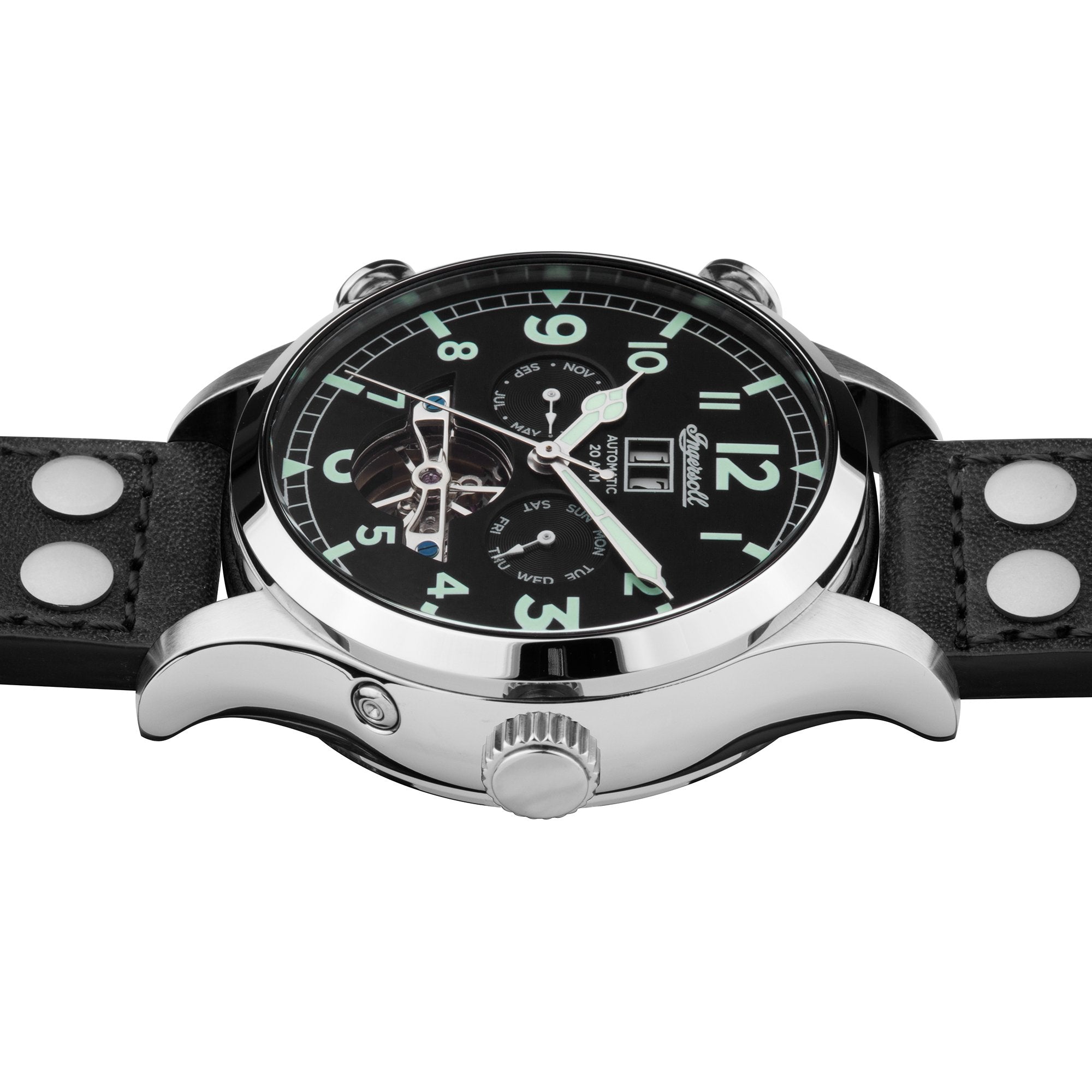 Wristwatch with a black dial and leather strap featuring metal studs.