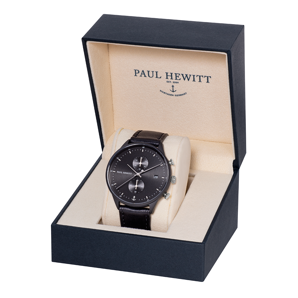Elegant black wristwatch displayed in a Paul Hewitt presentation box.