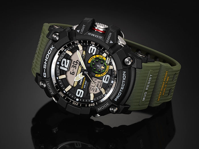 Rugged military-style wristwatch with a green strap and complex digital-analog face.