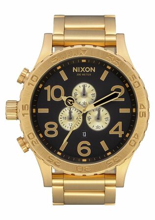 Gold-toned wristwatch with a black dial and multiple subdials.