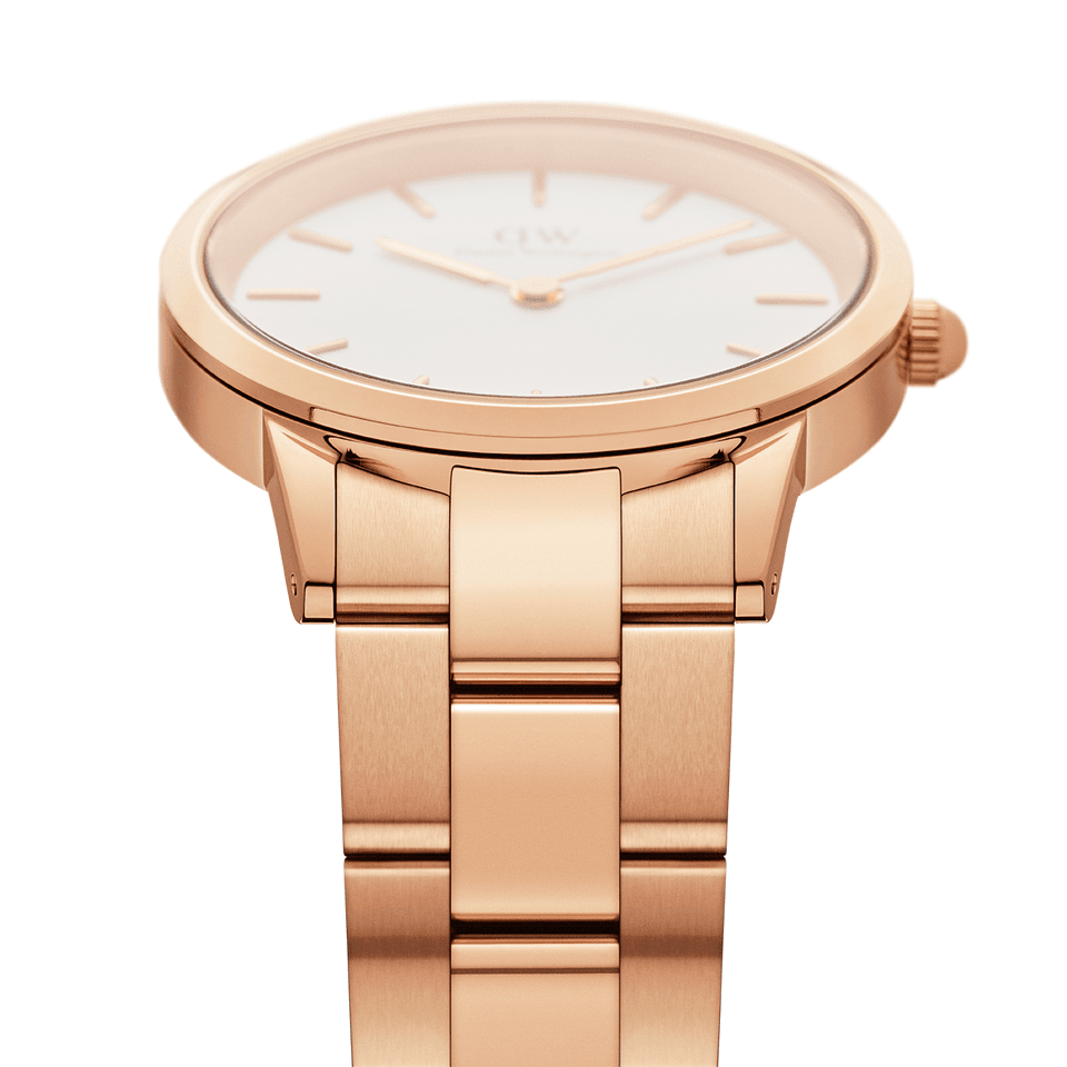 Rose gold wristwatch with a minimalist white dial and metal bracelet.