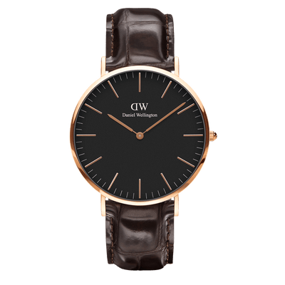 Elegant wristwatch with a black face, gold-tone case, and brown leather strap.