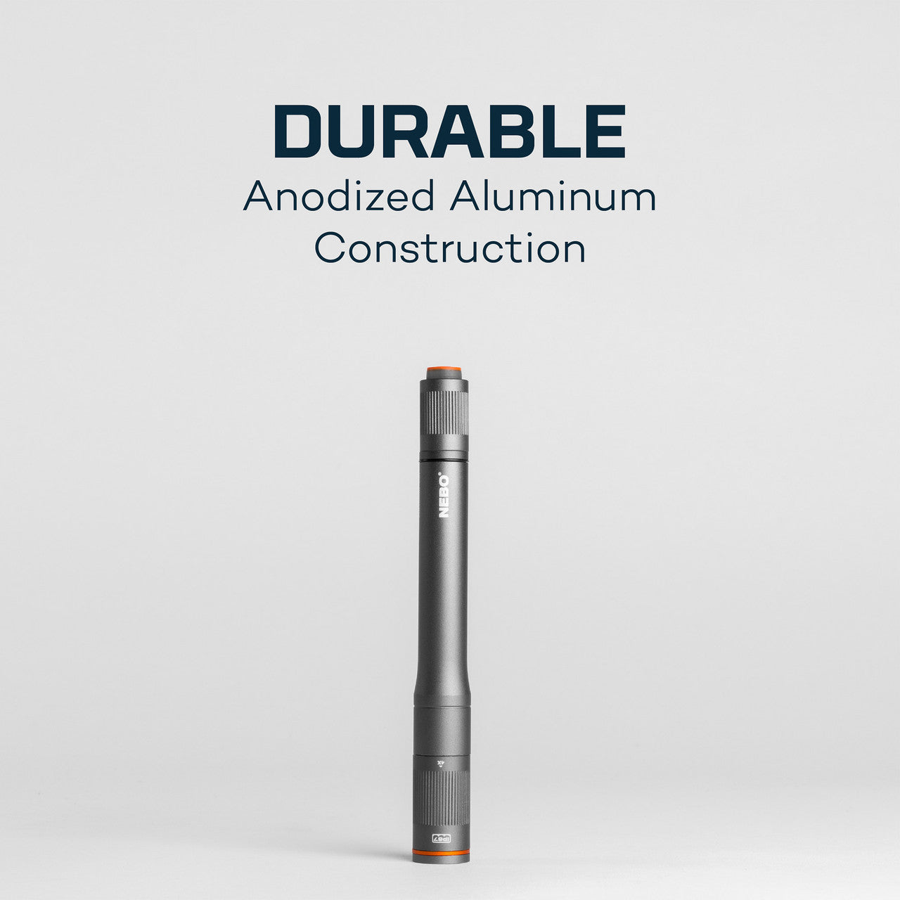 Sleek, cylindrical anodized aluminum flashlight or penlight with orange accents.