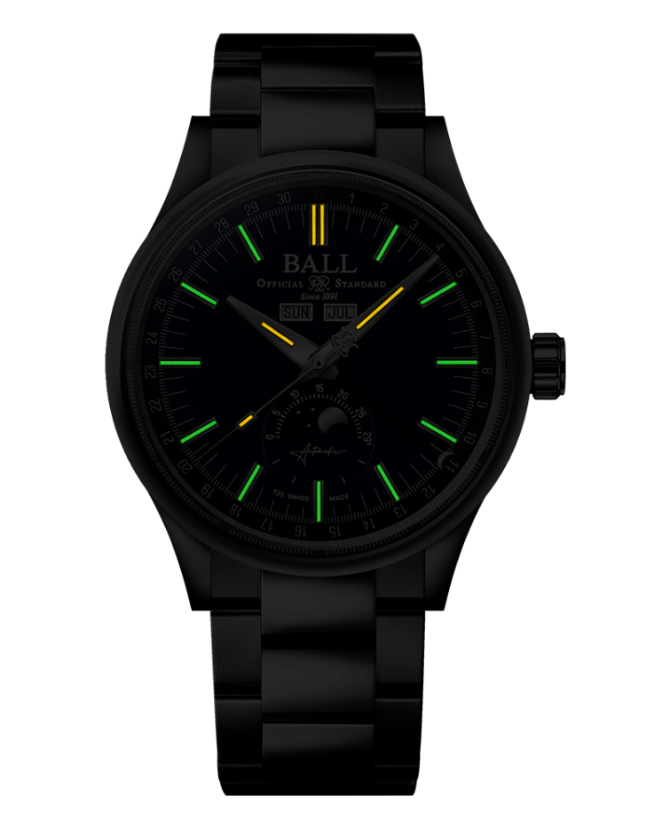 Black wristwatch with luminous green and yellow hour markers on its face.