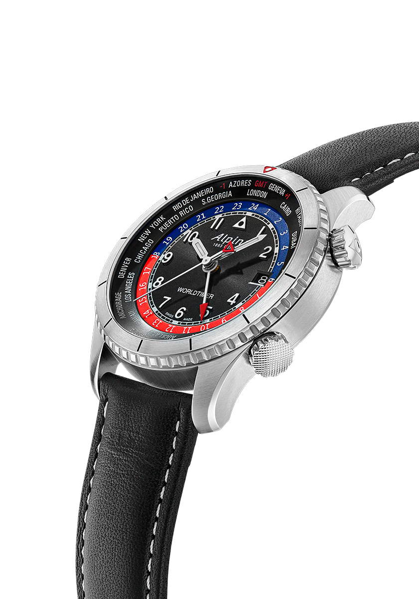 Wristwatch with a colorful dial and black leather strap.