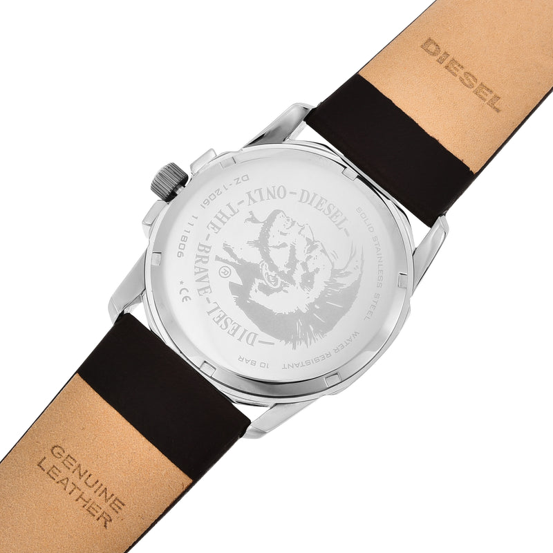 Wristwatch with a black leather strap and silver-toned case showing its engraved back.