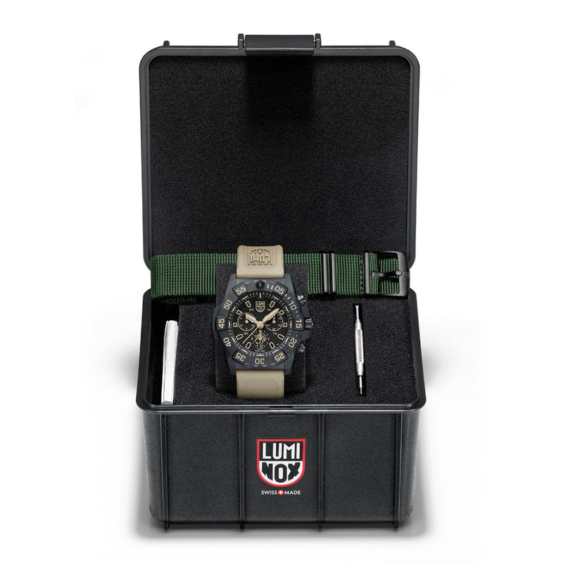 Rugged military-style wristwatch with a green strap in a black presentation box.