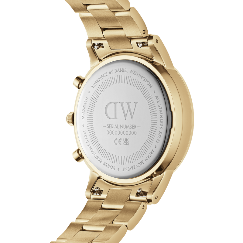 Gold-toned wristwatch with a metal band and circular face showing the back casing.