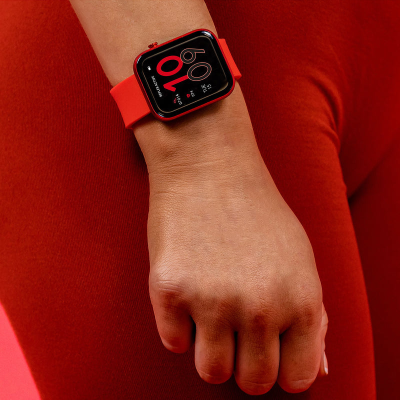 Red Apple Watch with a digital display showing the time 10:09.