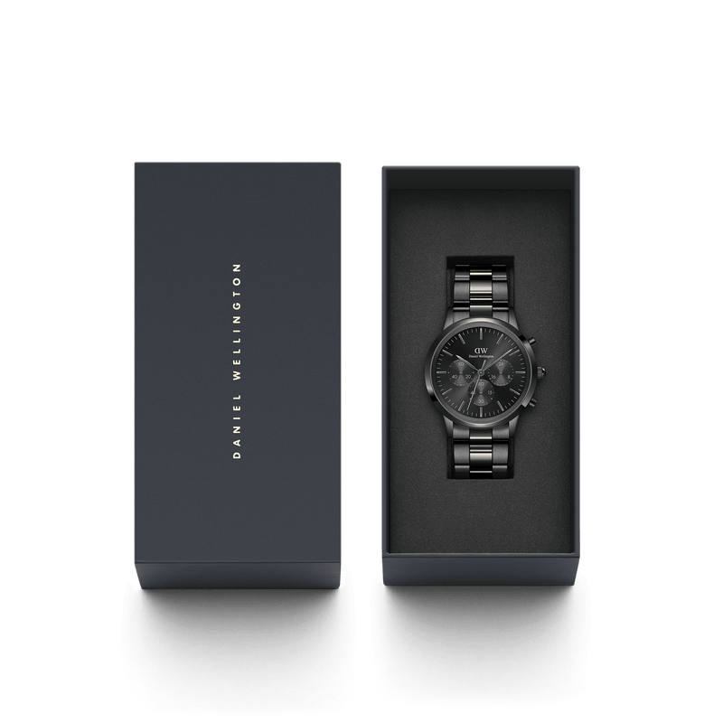 Sleek black wristwatch in an open presentation box.