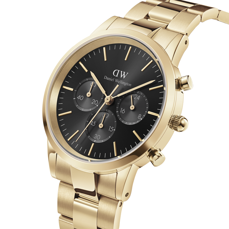 Gold-toned wristwatch with a black dial and chronograph subdials.