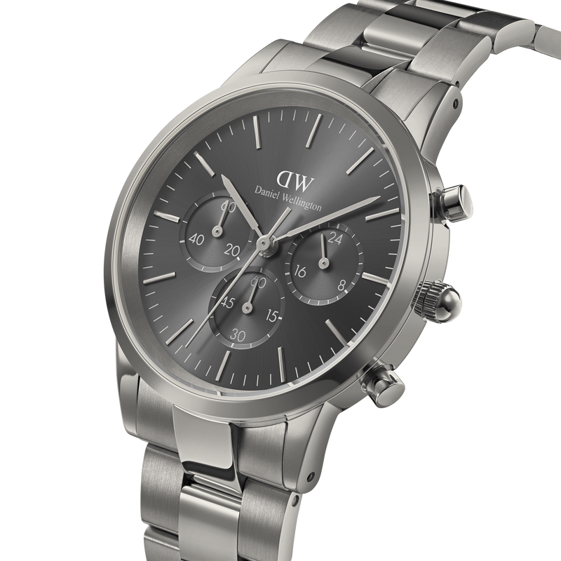 Stainless steel wristwatch with a dark gray dial and chronograph subdials.