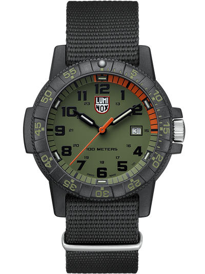 Rugged military-style wristwatch with a green dial and black nylon strap.