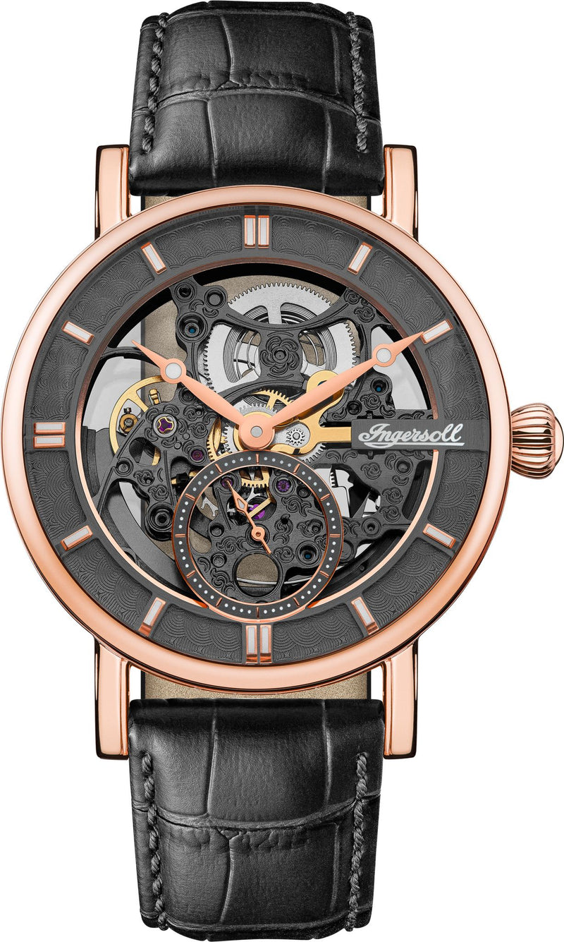 Luxury skeleton watch with a rose gold case and black leather strap.