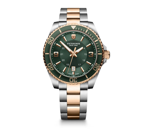 Luxury wristwatch with a green dial and two-tone silver and rose gold metal bracelet.