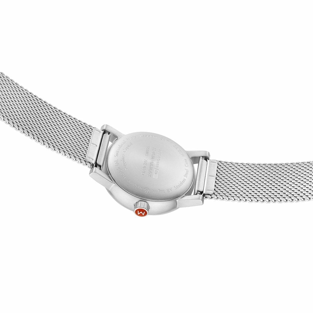 Silver wristwatch with a mesh metal band and a small orange gem on the crown.