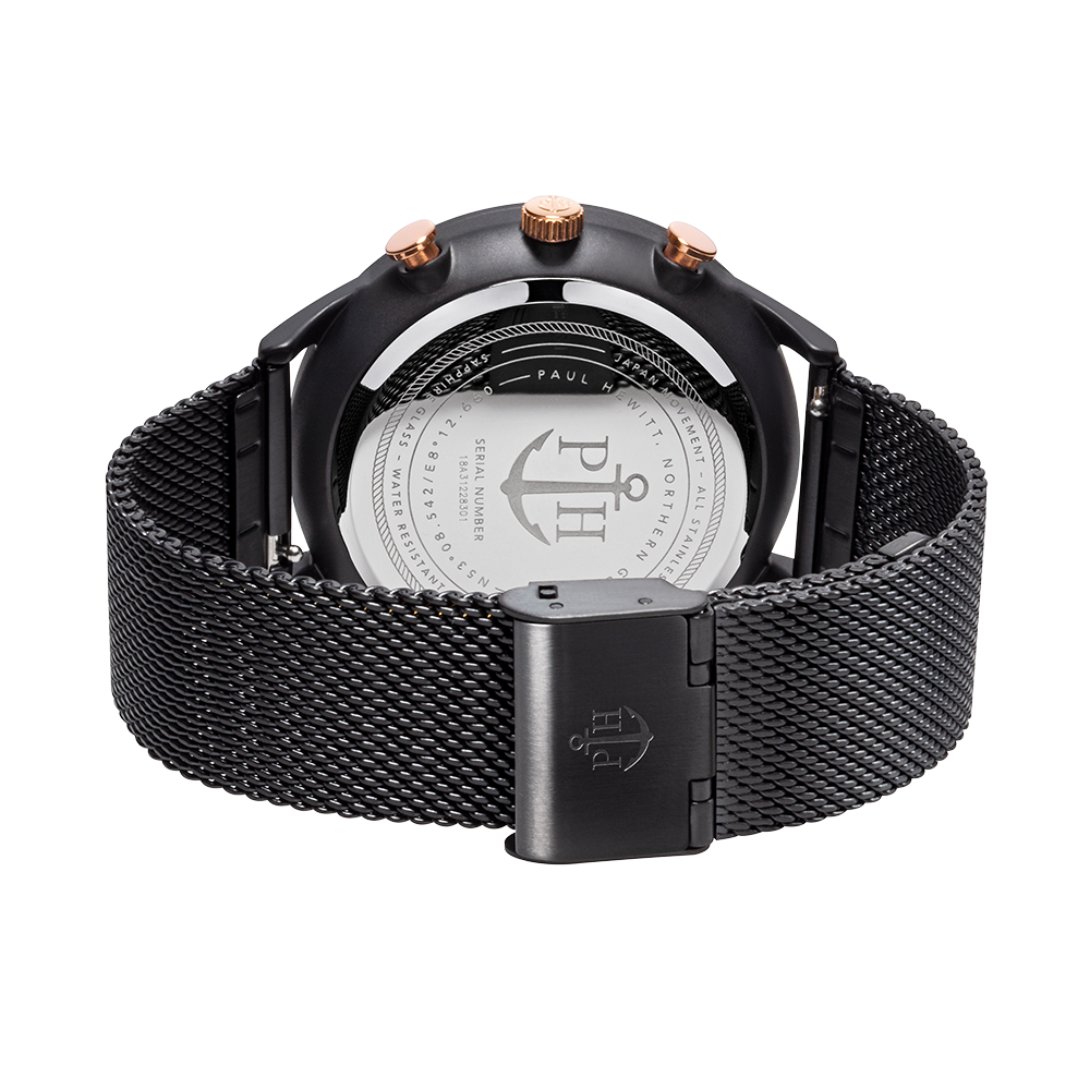 Black wristwatch with a mesh metal band and rose gold accents.