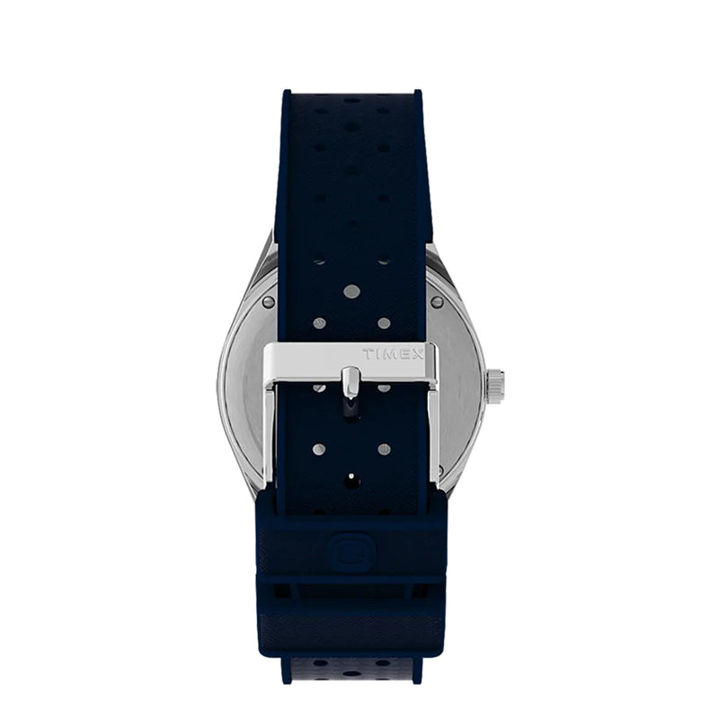 Wristwatch with a navy blue rubber strap and silver-toned case back.