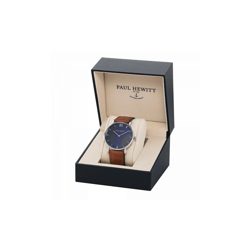 Wristwatch with a blue face and brown leather strap in a presentation box.