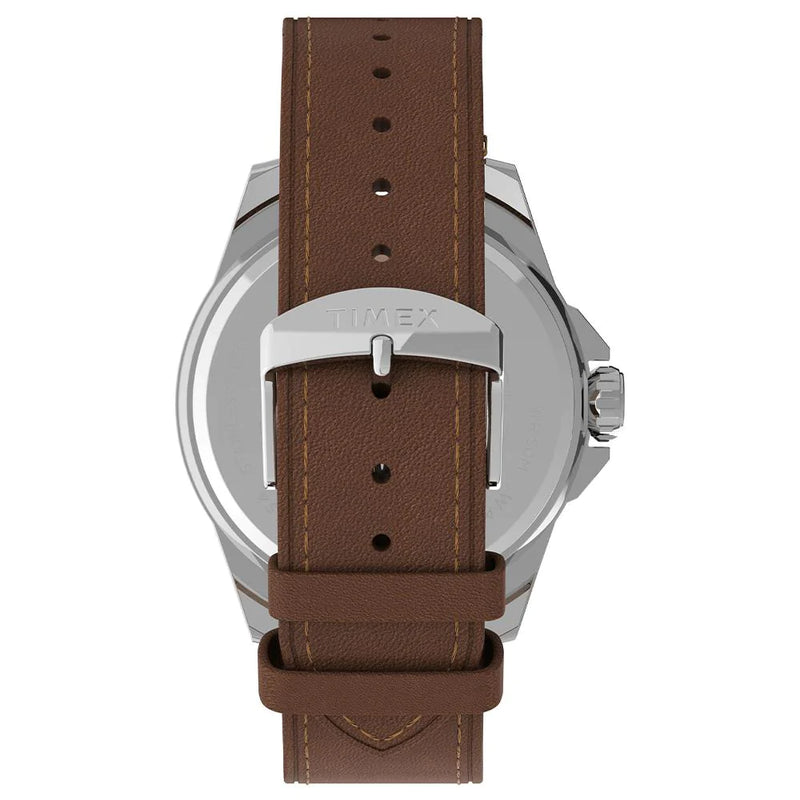 Wristwatch with a silver case and brown leather strap.