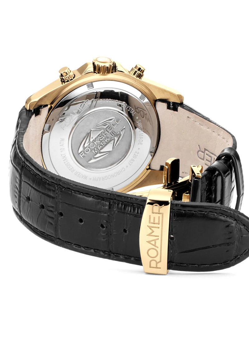 Luxury wristwatch with a gold case and black leather strap.