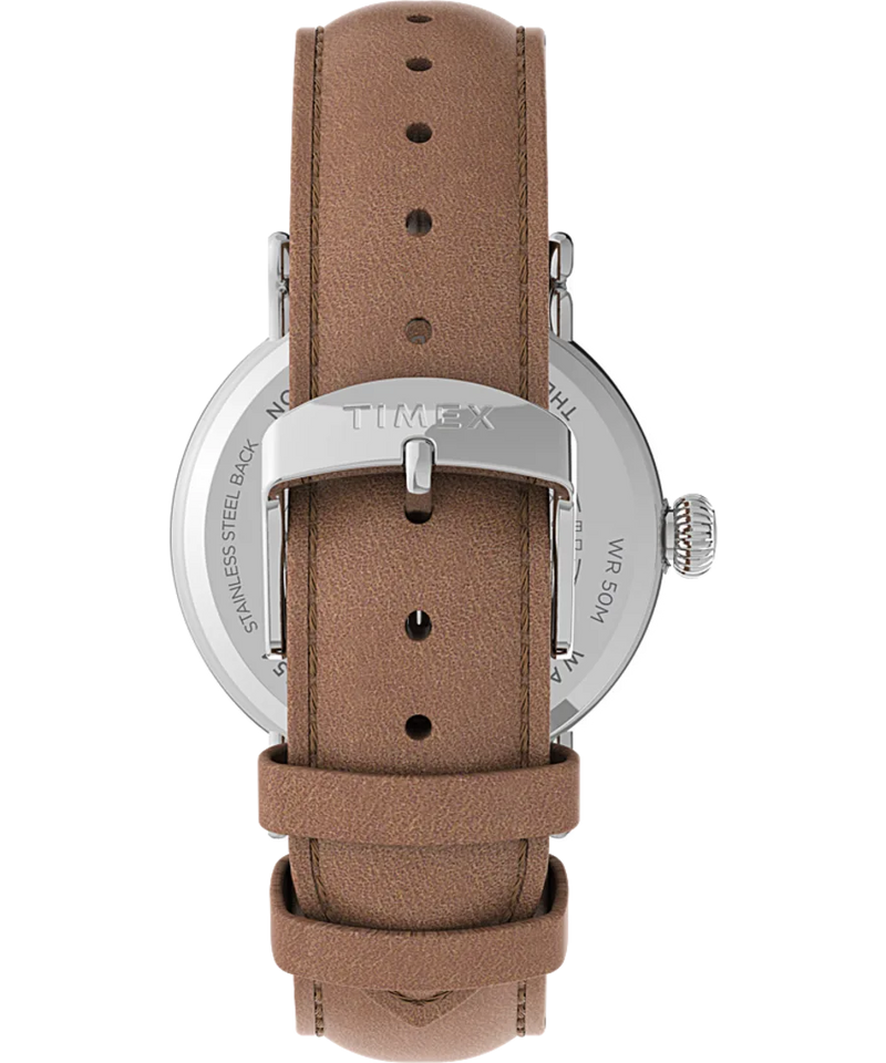 Wristwatch with a brown leather strap and silver-toned case.