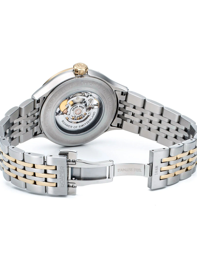 Luxury wristwatch with a visible mechanical movement through the transparent case back.