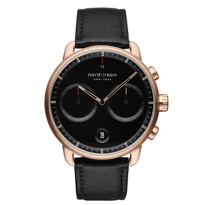 Elegant wristwatch with a black leather strap, rose gold case, and black dial featuring chronograph subdials.