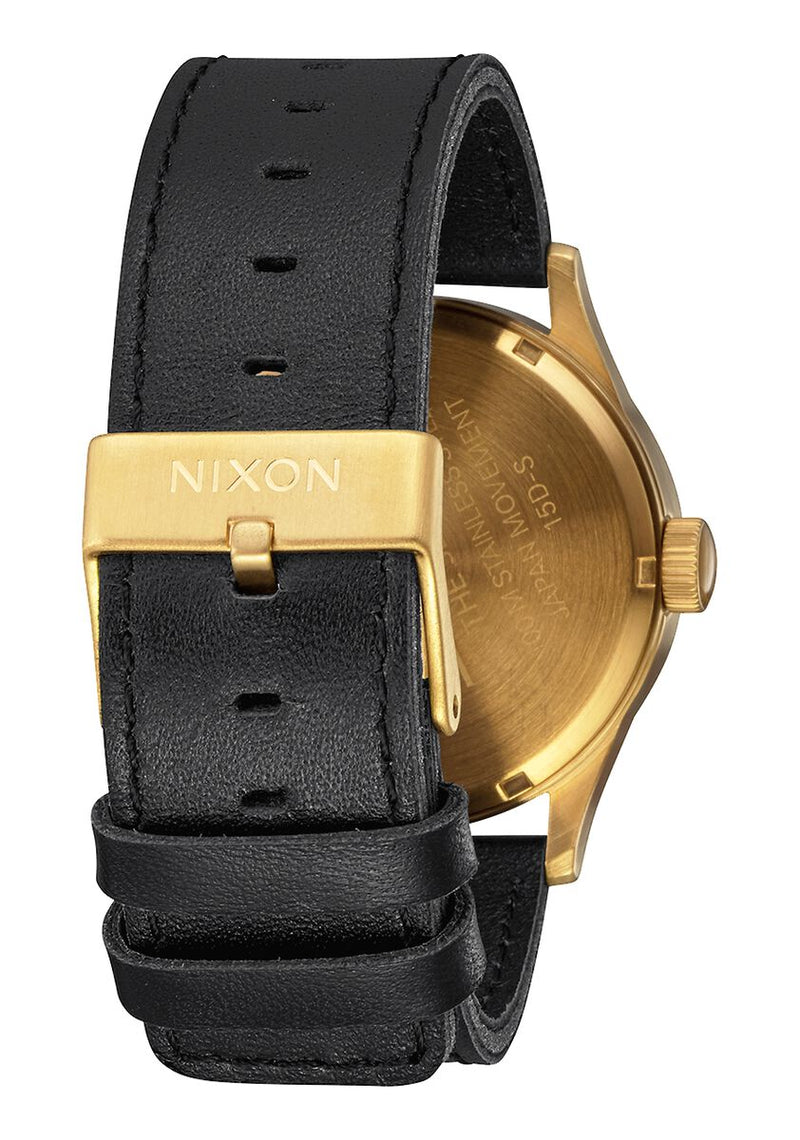 Gold-toned wristwatch with a black leather strap.