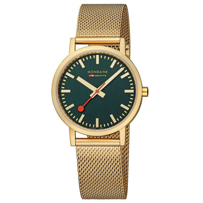 Gold-toned wristwatch with a green dial and mesh metal band.