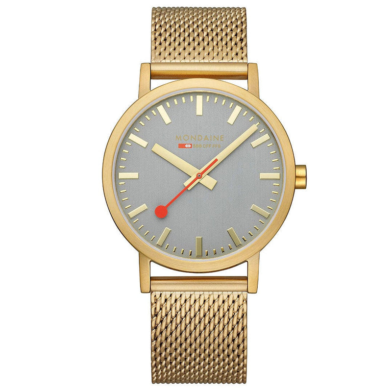 Gold-toned wristwatch with a gray dial and mesh metal band.