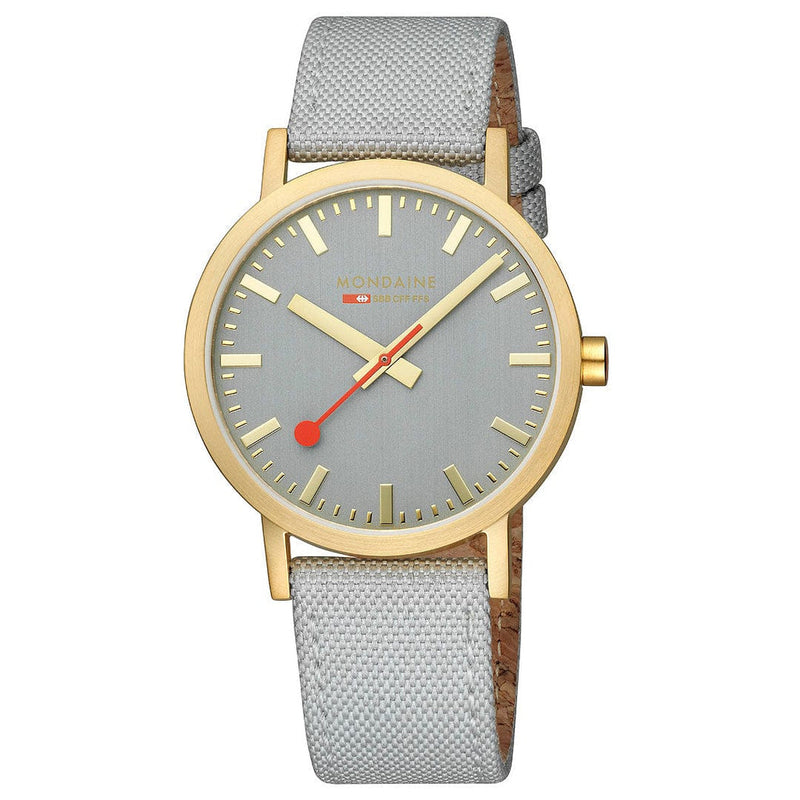 Wristwatch with a gold-tone case, gray dial, and light gray fabric strap.