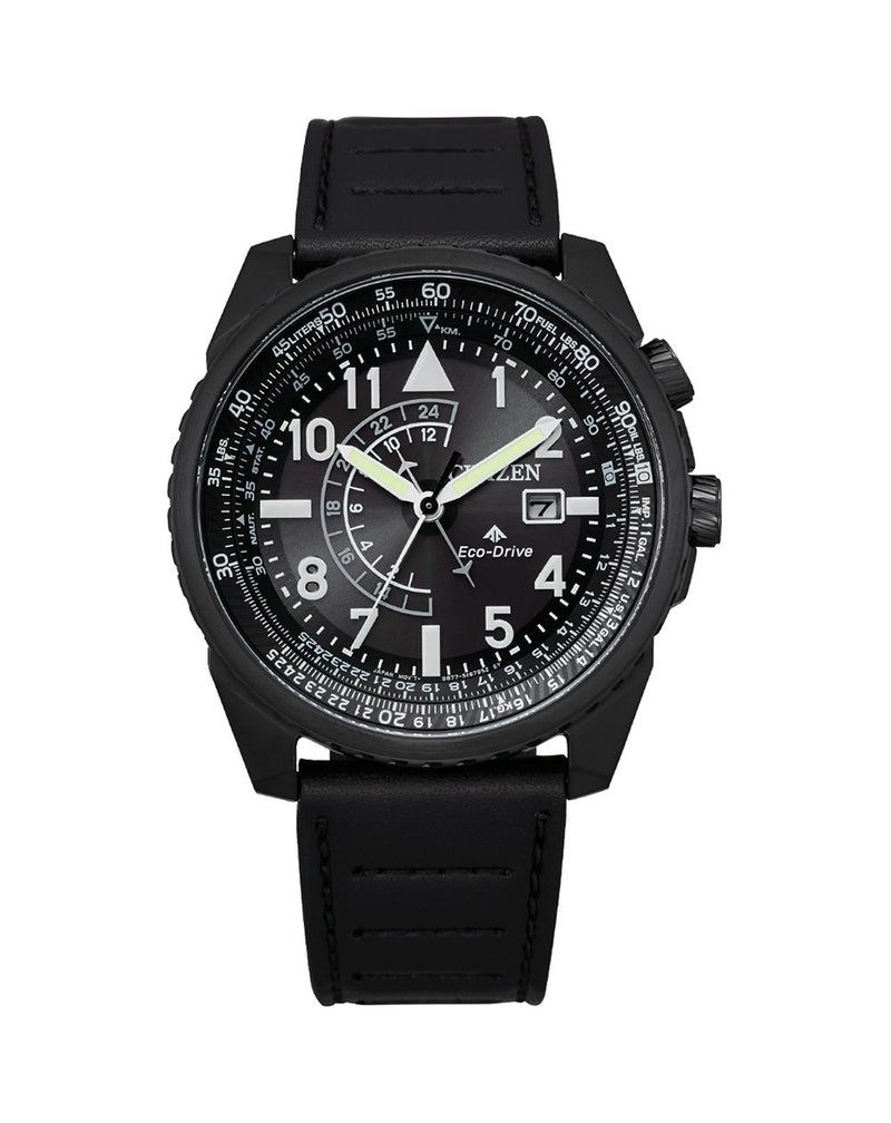 Black wristwatch with a round face, white numerals, and a rubber strap.