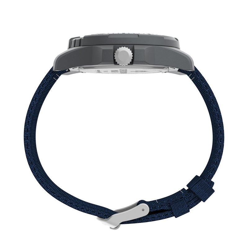 Wristwatch with a navy blue fabric strap and gray metal case.