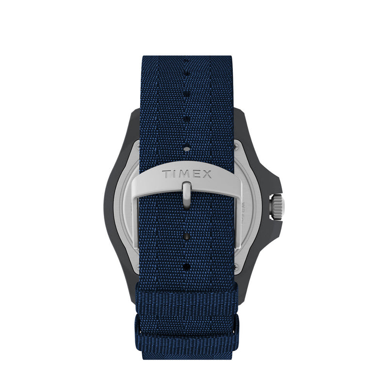 Navy blue fabric watch strap with a silver Timex buckle.