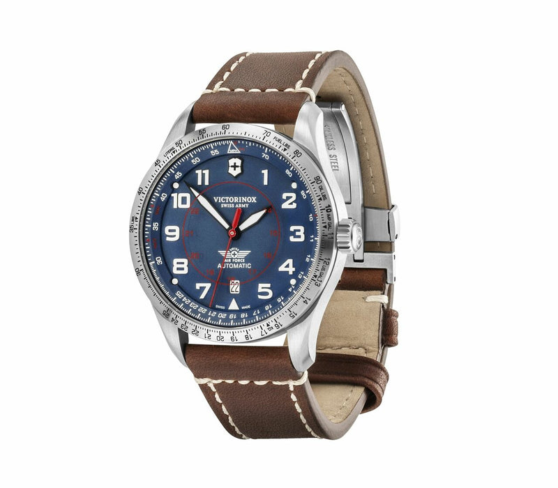 Wristwatch with a blue dial, brown leather strap, and silver-toned case.