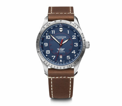 Wristwatch with a blue dial, silver case, and brown leather strap.