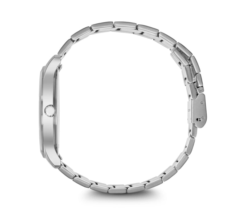 Silver wristwatch with a metal link band viewed from the side.