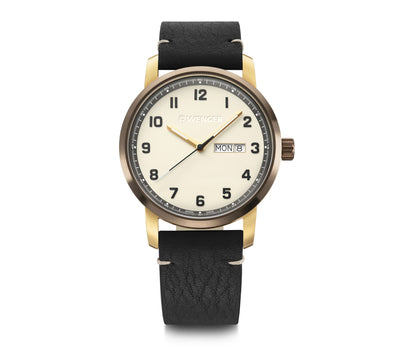 Wristwatch with a cream-colored dial, gold-toned case, and black leather strap.