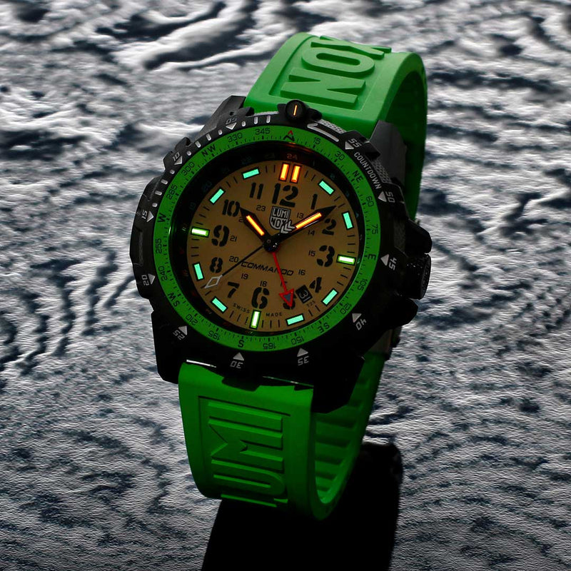 Sporty wristwatch with a bright green strap and illuminated dial.