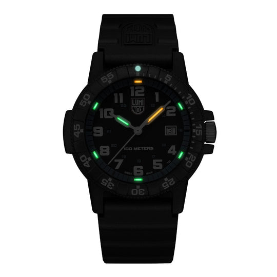 Black tactical wristwatch with luminous markings on the dial.