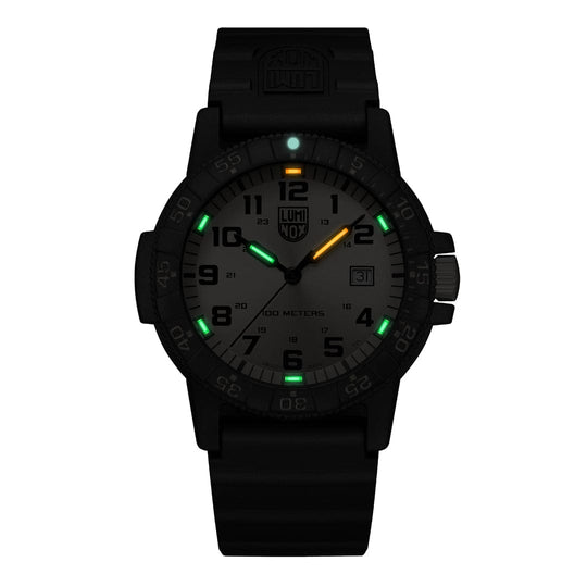 Black tactical wristwatch with luminous markings on the dial.